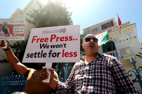 Journalists protest during a press freedom rally in Tunis