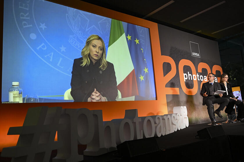 La presidente del Consiglio Meloni in collegamento video alla presentazione di Photoansa 2023 - RIPRODUZIONE RISERVATA